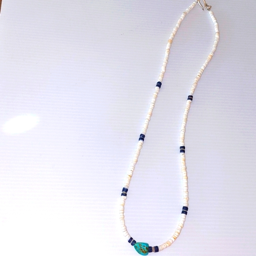 Pukka Shells And SilpadaTurquoise. Handmade. Dark Blue and  Cream Pukka Shells .